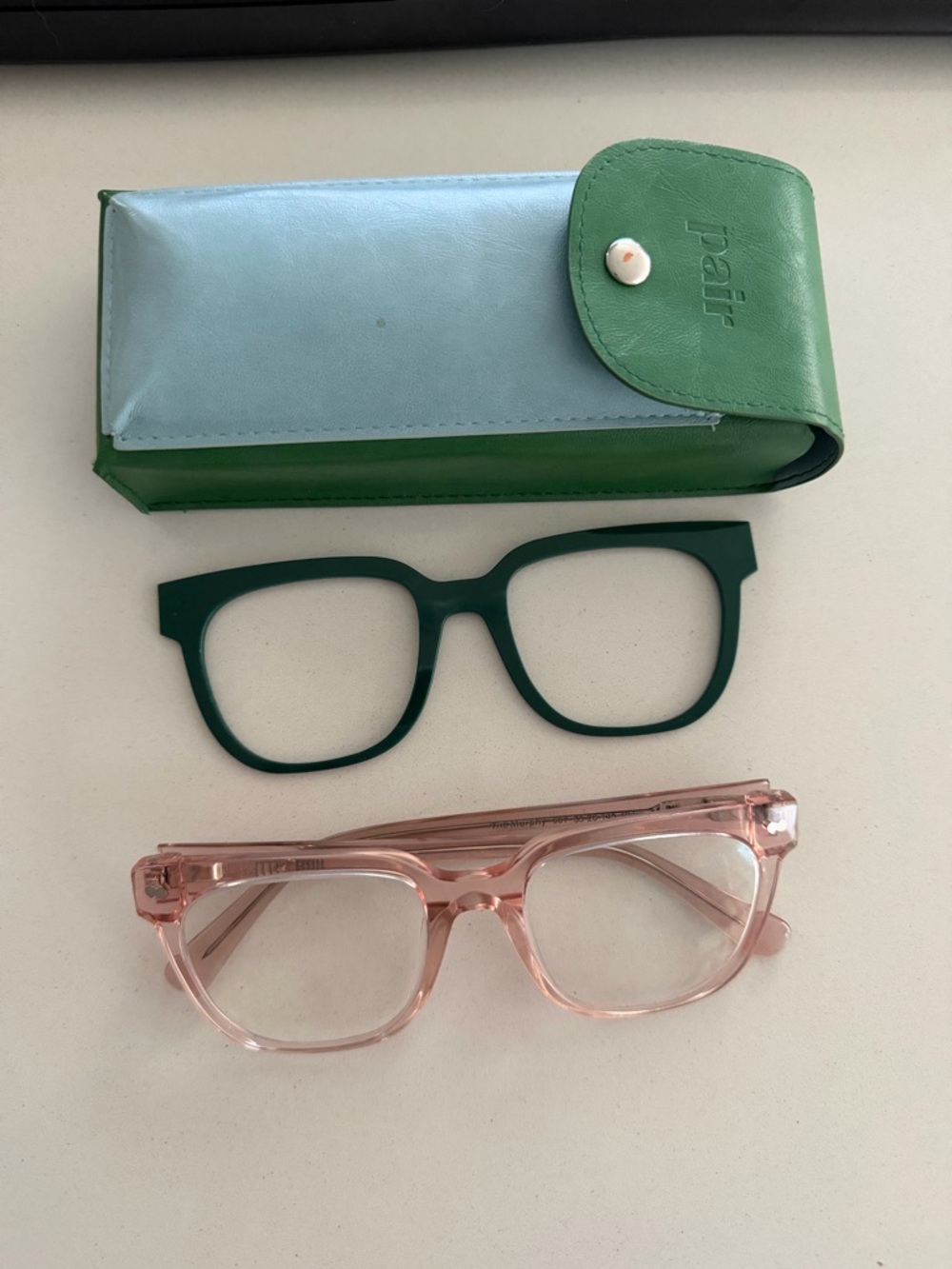 pair Pink Translucent Square Women's Glasses with Green Case by